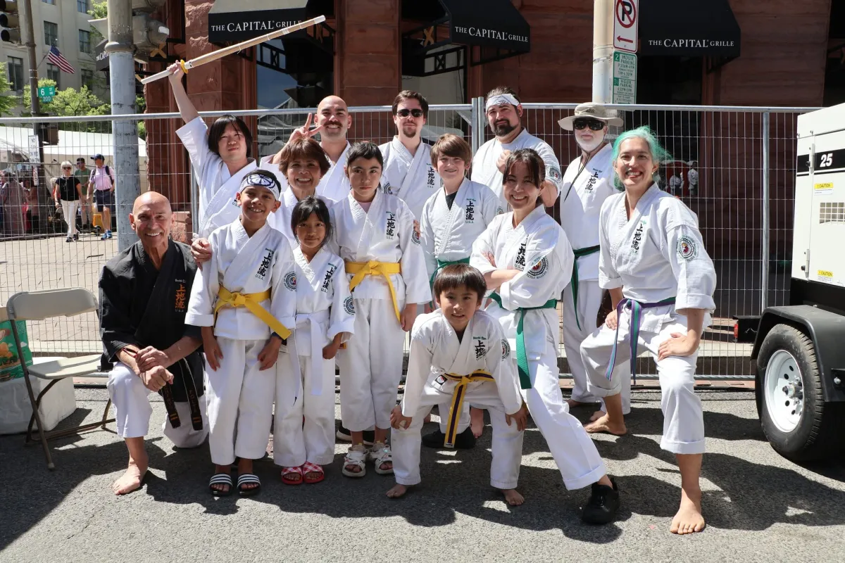 Master Nestor Folta with Chantilly Family Martial Arts students and instructors in their karate uniforms